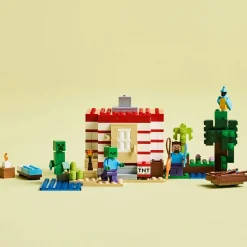 Lego minecraft 21275 casa giungla esplosiva: tnt, barca, 3 pers. 8+><noscript><img width=