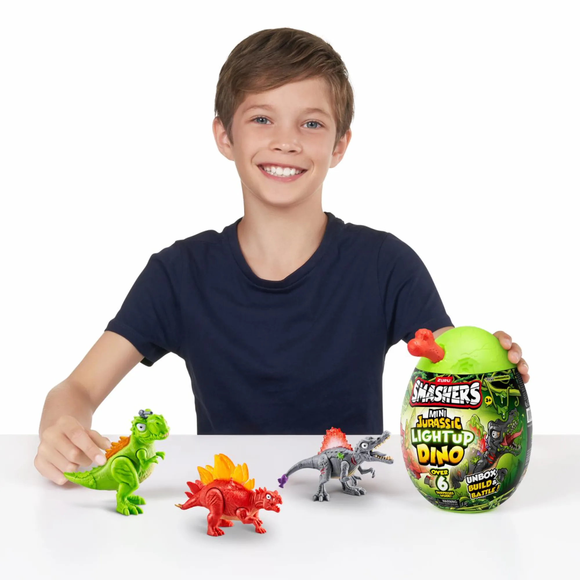 Smashers mini jurassic light up dino egg> Action Figures